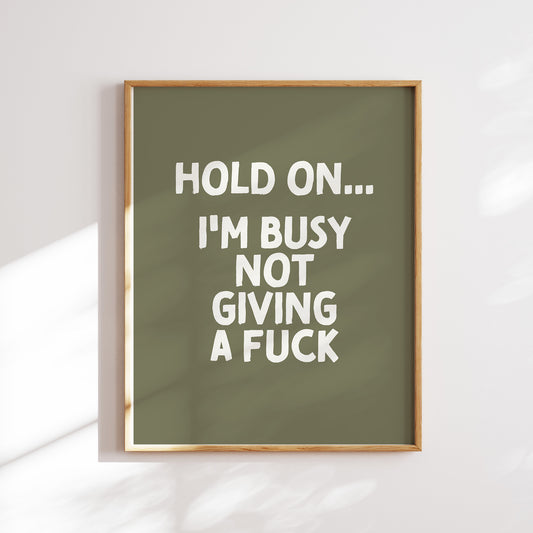 Trendy printable wall art poster featuring a  "I'm busy not giving a fuck" text in a stylish cream and olive green design. Perfect for adding a touch of cool humor to any room or as a unique gift. Instantly downloadable and easy to print at home or through a professional service.
Shop unique wall art by WonkyWonder now