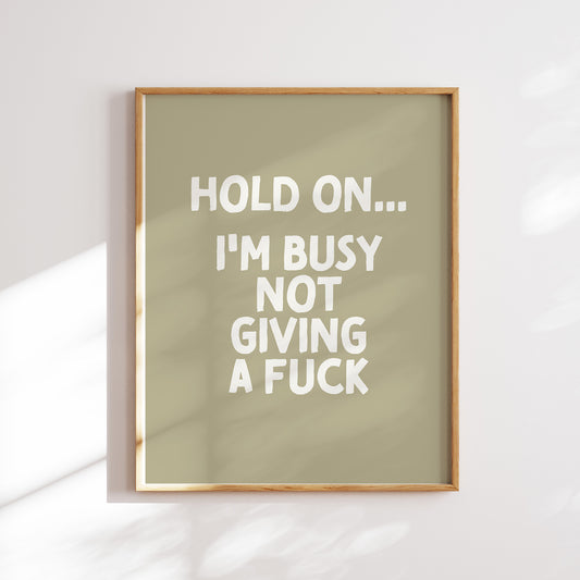 Trendy printable wall art poster featuring a  "I'm busy not giving a fuck" text in a stylish cream and olive green design. Perfect for adding a touch of cool humor to any room or as a unique gift. Instantly downloadable and easy to print at home or through a professional service.
Shop unique wall art by WonkyWonder now