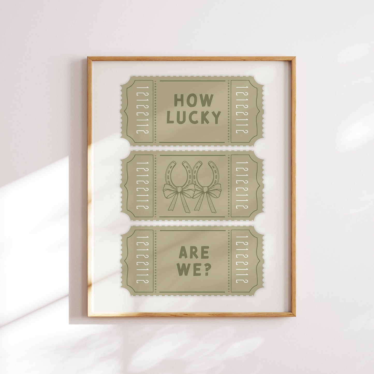 Trendy and girly printable olive green wall art poster featuring a retro tickets with a slogan 'How Lucky Are We?  digital download poster. Instantly download, print, and brighten up your home with this unique wall art. 
Shop cool wall art by WonkyWonder now.