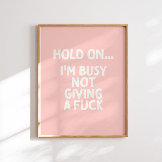 Trendy printable wall art poster featuring a  "I'm busy not giving a fuck" text in a stylish cream and fuzzy peach pink design. Perfect for adding a touch of cool humor to any room or as a unique gift. Instantly downloadable and easy to print at home or through a professional service.
Shop unique wall art by WonkyWonder now.