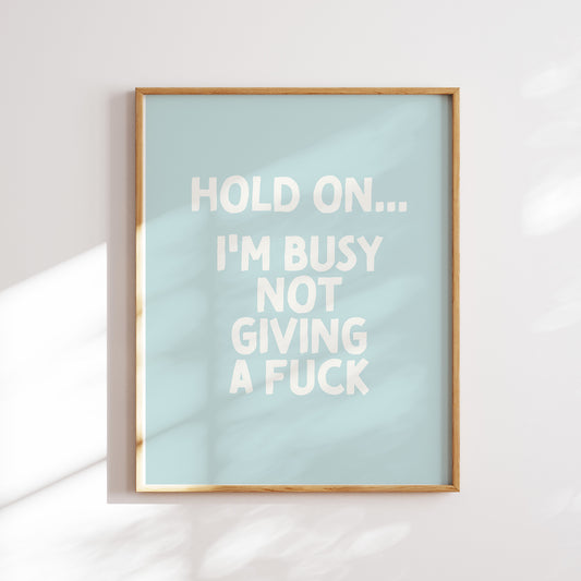 Trendy printable wall art poster featuring a  "I'm busy not giving a fuck" text in a stylish teal and white cream design. Perfect for adding a touch of cool humor to any room or as a unique gift. Instantly downloadable and easy to print at home or through a professional service.
Shop unique wall art by WonkyWonder now.