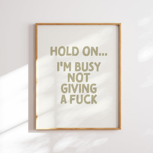 Trendy printable wall art poster featuring a  "I'm busy not giving a fuck" text in a stylish cream and olive green design. Perfect for adding a touch of cool humor to any room or as a unique gift. Instantly downloadable and easy to print at home or through a professional service.
Shop unique wall art by WonkyWonder now