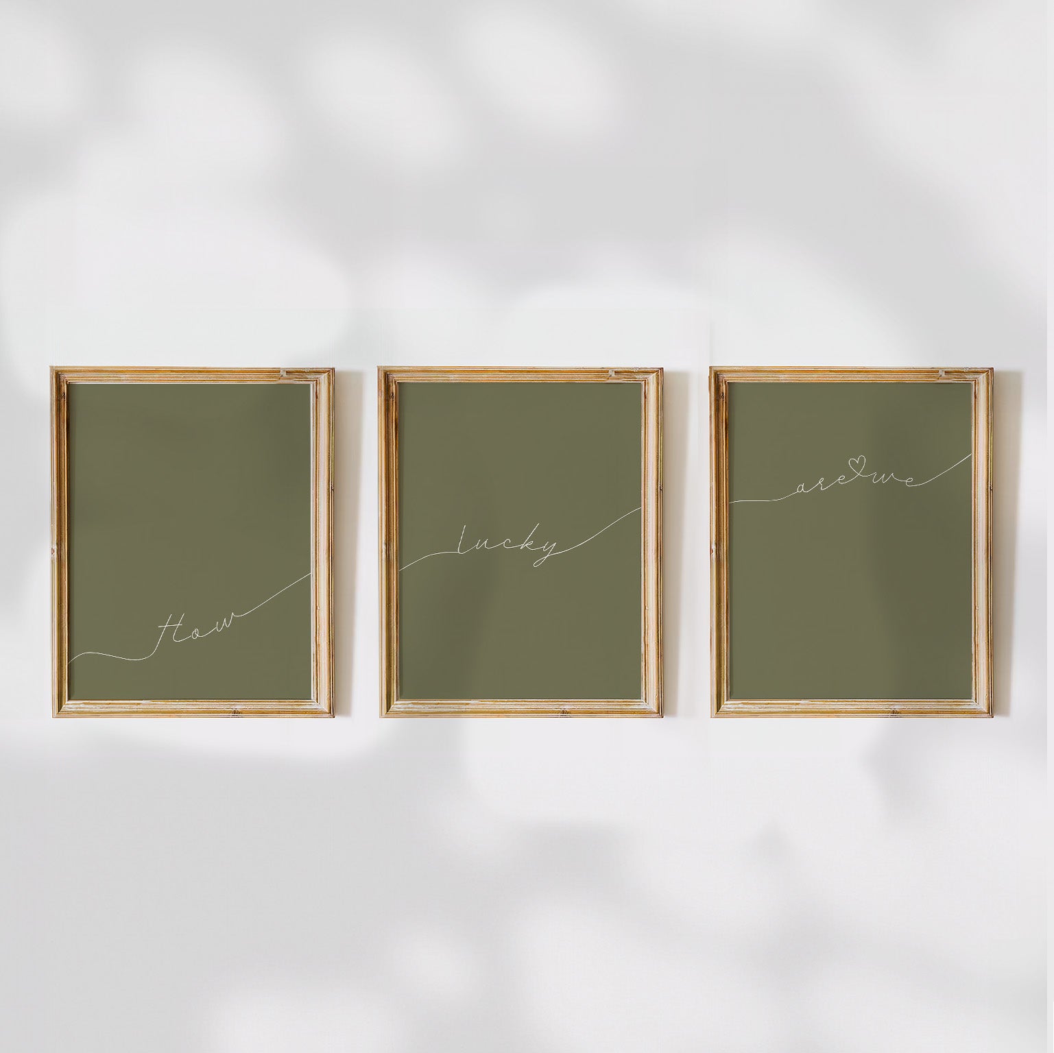 Set of 3 preppy aesthetic sage green posters with cursive text “How Lucky Are We” in white. Perfect for motivational gallery walls or above-the-bed decor.  