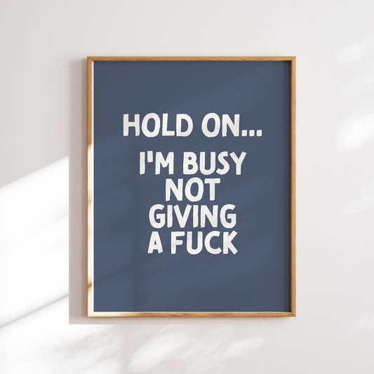 Hold on I'm busy not giving a fuck trendy funny  home office wall art slogan in navy blue