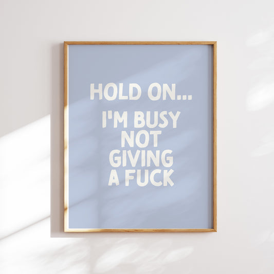 Hold on I'm busy not giving a fuck trendy funny  home office wall art slogan in pastel boho blue and cream