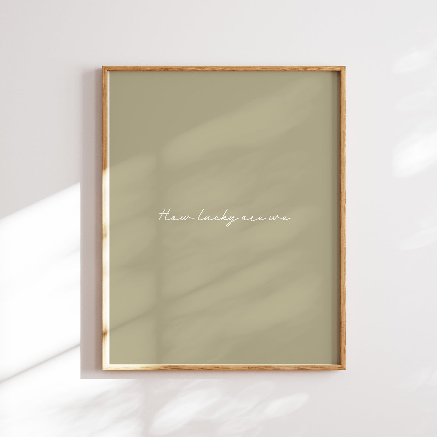 Olive green minimalistic-style 'How Lucky Are We?' digital download poster. &nbsp;Whether you're sprucing up your living room, bedroom, dorm or office, this print will add a warm and thoughtful touch to your space. The best part? You can download it instantly.
Shop cool wall art by WonkyWonder now.