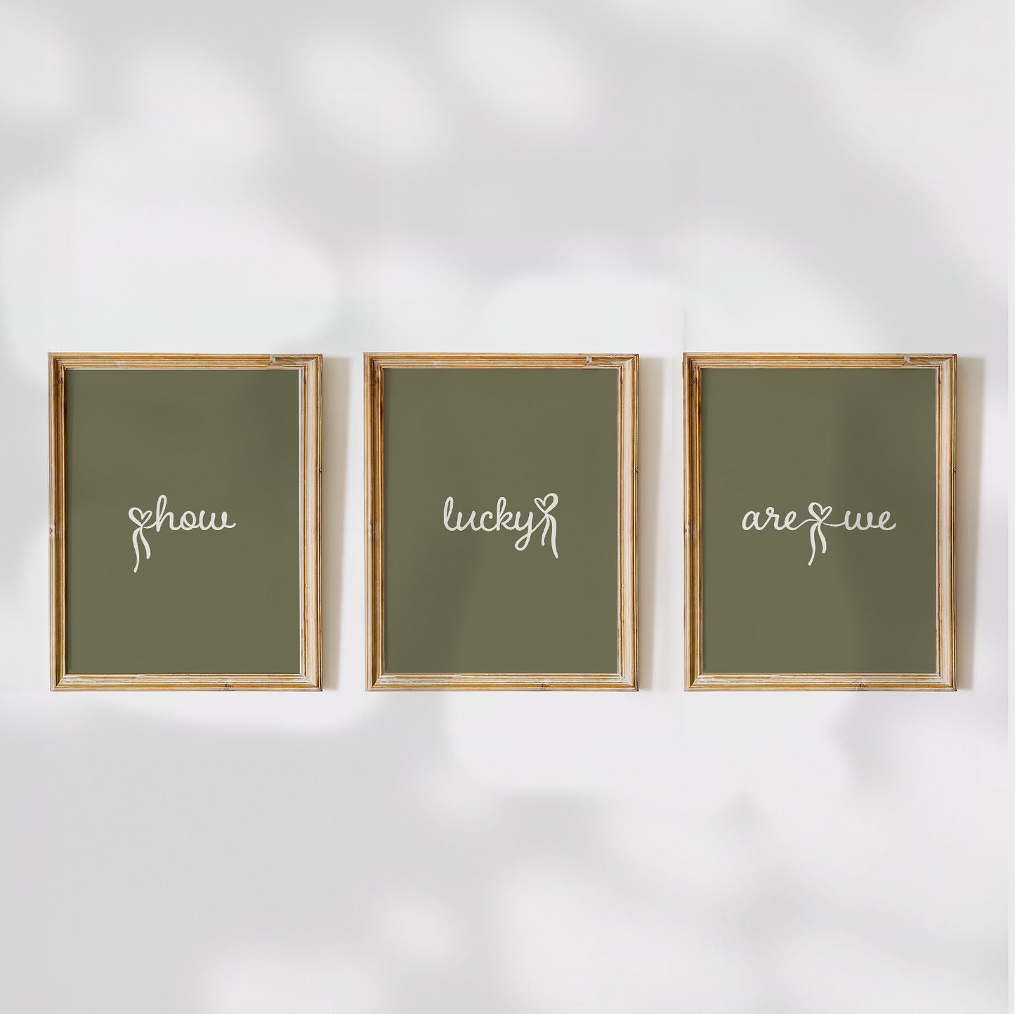 Set of 3 aesthetic pink posters with cursive text reading “How Lucky Are We” in white. Digital download wall art for a stylish gallery setup. 