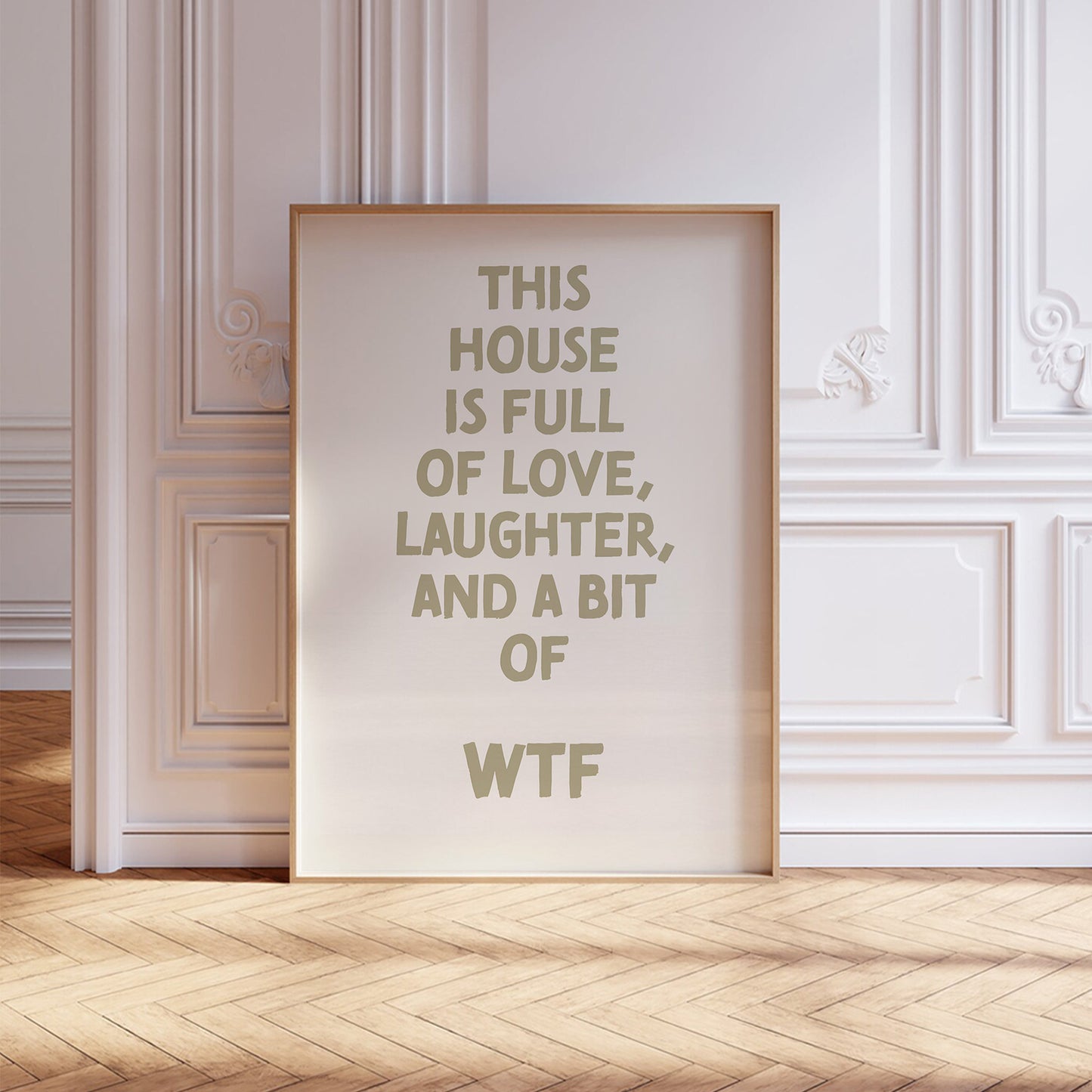 Trendy printable wall art poster featuring a  ""This house is full of love, laughter and a bit of wtf"" text in a stylish cream and boho olive green design. Perfect for adding a touch of cool humor to any room or as a unique gift. Instantly downloadable.
Shop unique wall art now by WonkyWonder.